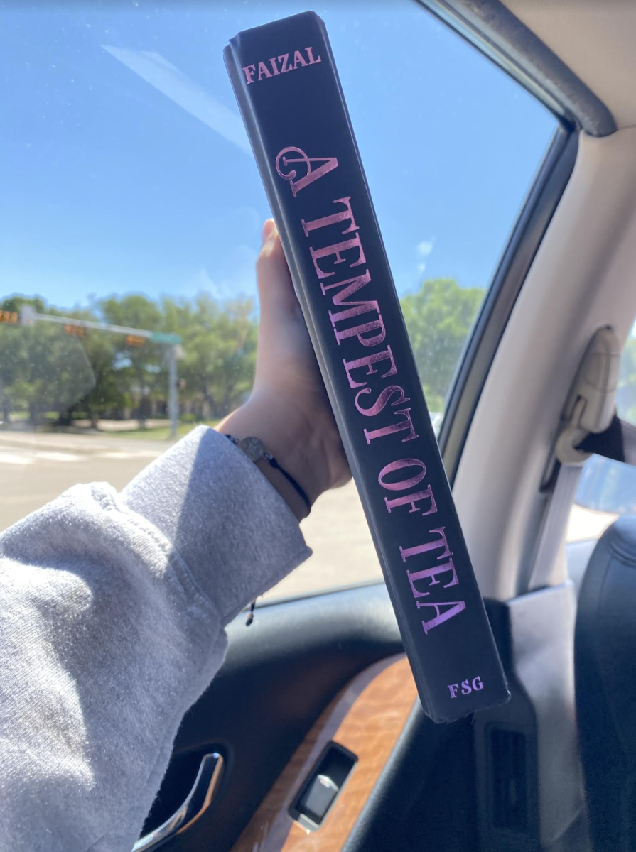 Picture depicting the naked cover of the book, alongside with the spine art. 